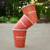 Biodegradable single wall paper cups in red and white with 'Jobindex' logo
